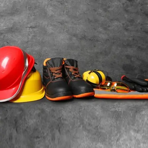 safety-equipment-helmet-and-boots.webp